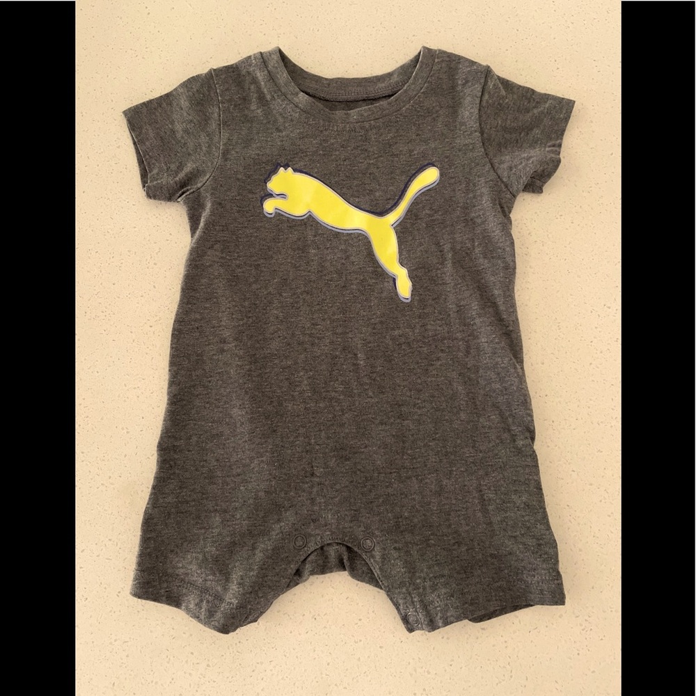 Two Adorable puma onsie. EUC